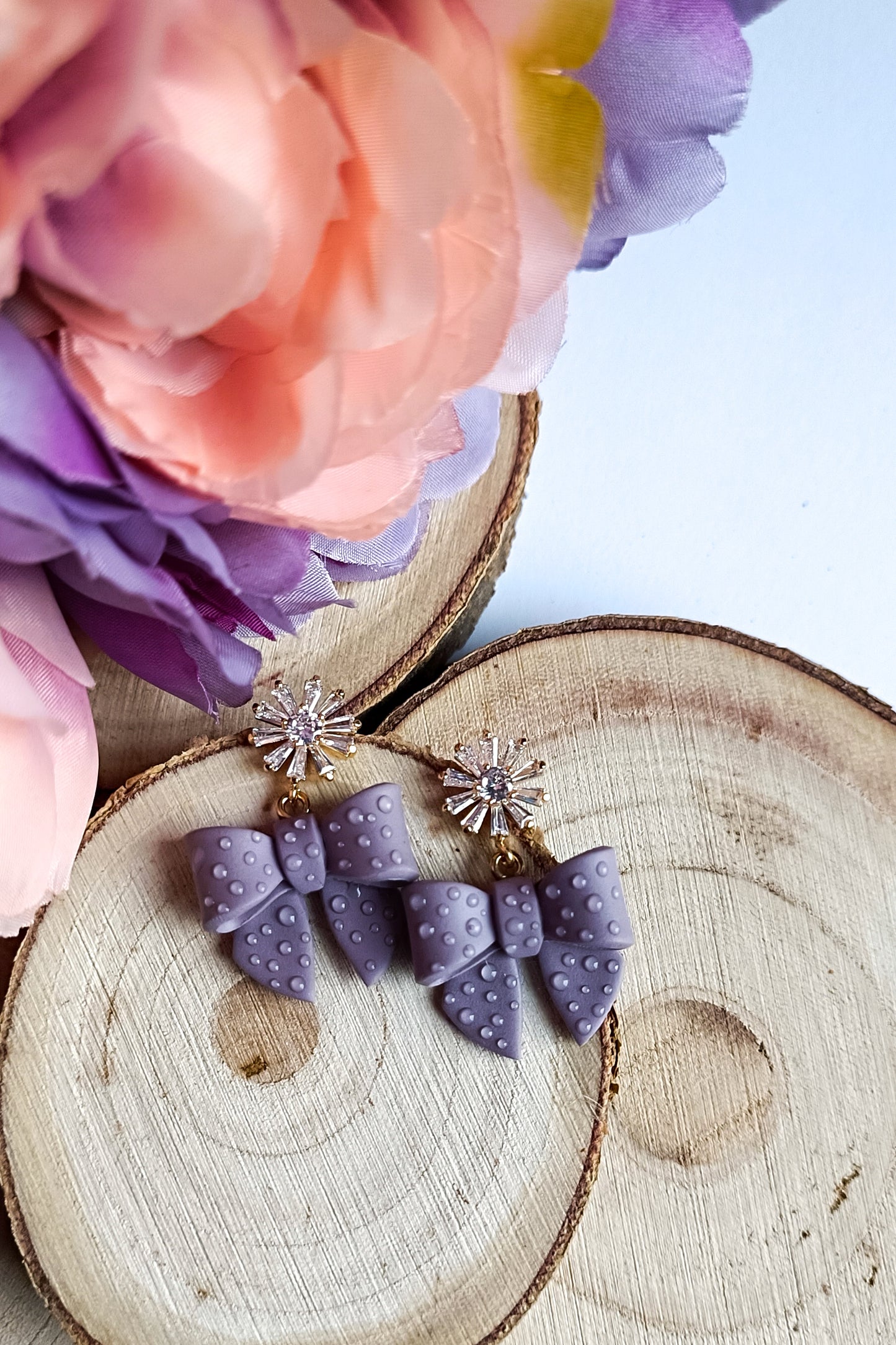Dusty light lilac bows