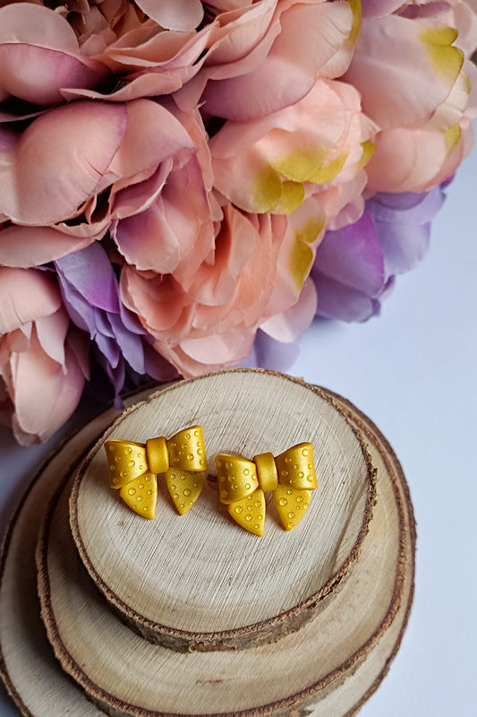 Yellow metallic bows